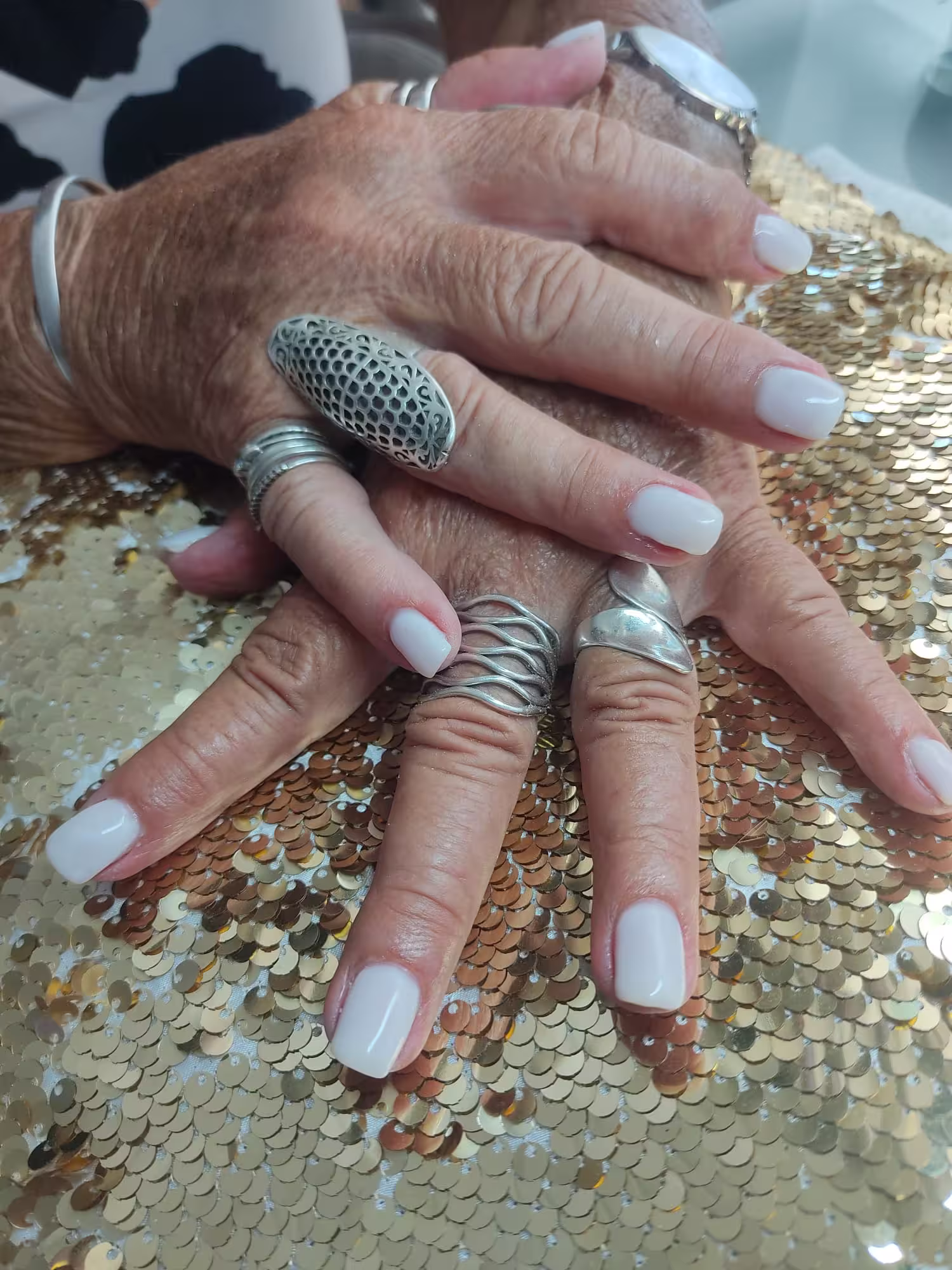 Long wavy brown hair with caramel highlights at ZenzHair Albir